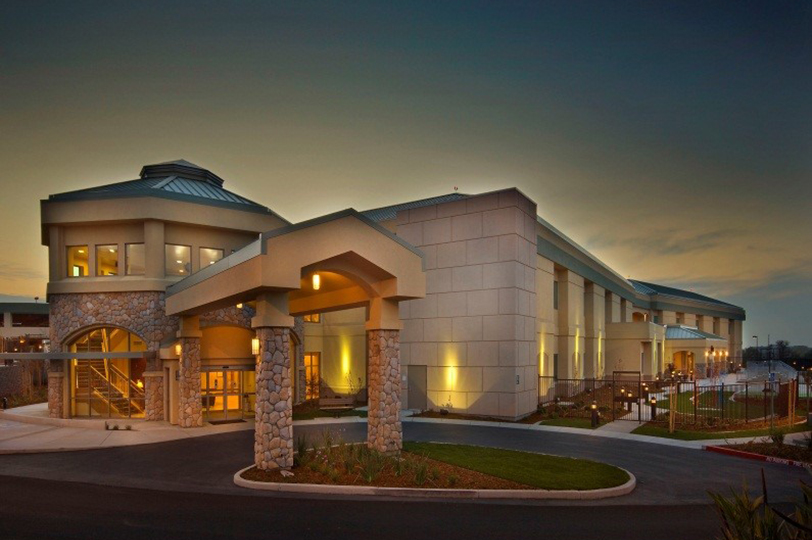 Exterior view of the front of the building and patient drop off area