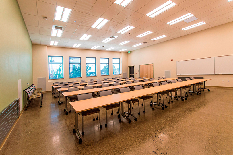 Classroom with rows of tables and chairs