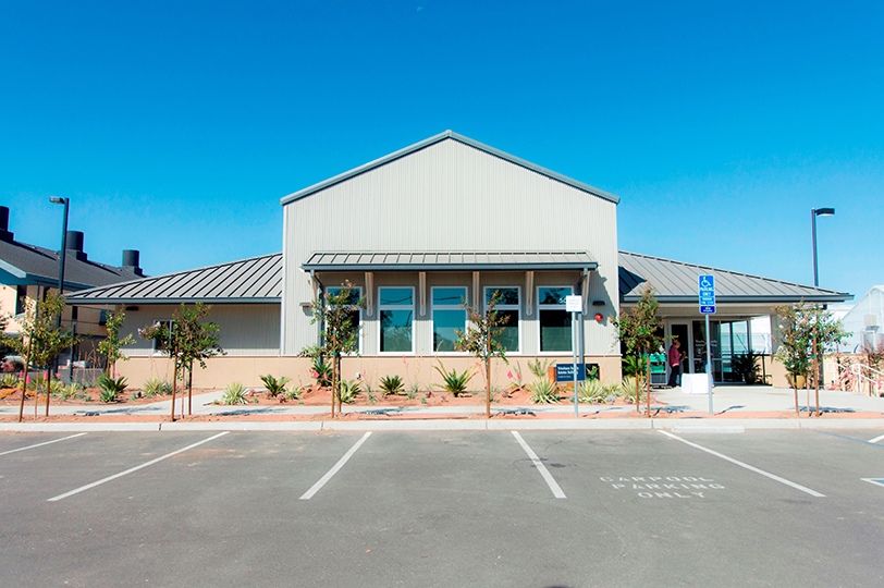 Exterior view of building and parking area